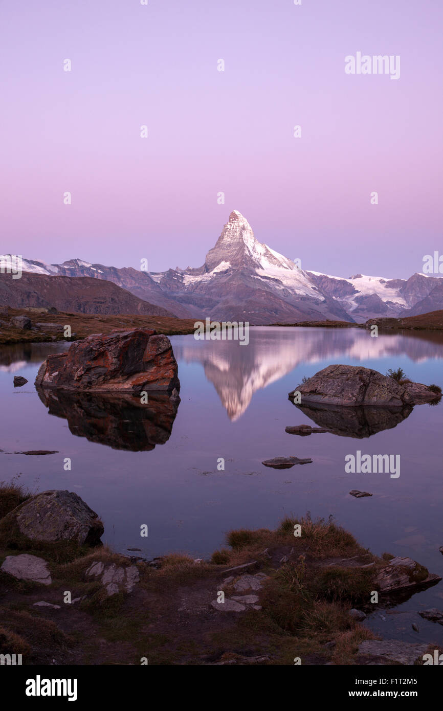 The Matterhorn reflected in the Stellisee at dusk, Zermatt, Canton of Valais, Pennine Alps, Swiss Alps, Switzerland, Europe Stock Photo