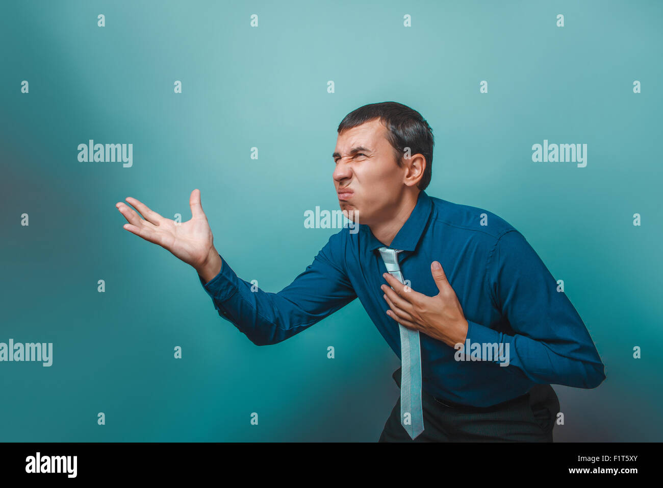 a man of European appearance thirty years sick shows discontent Stock Photo