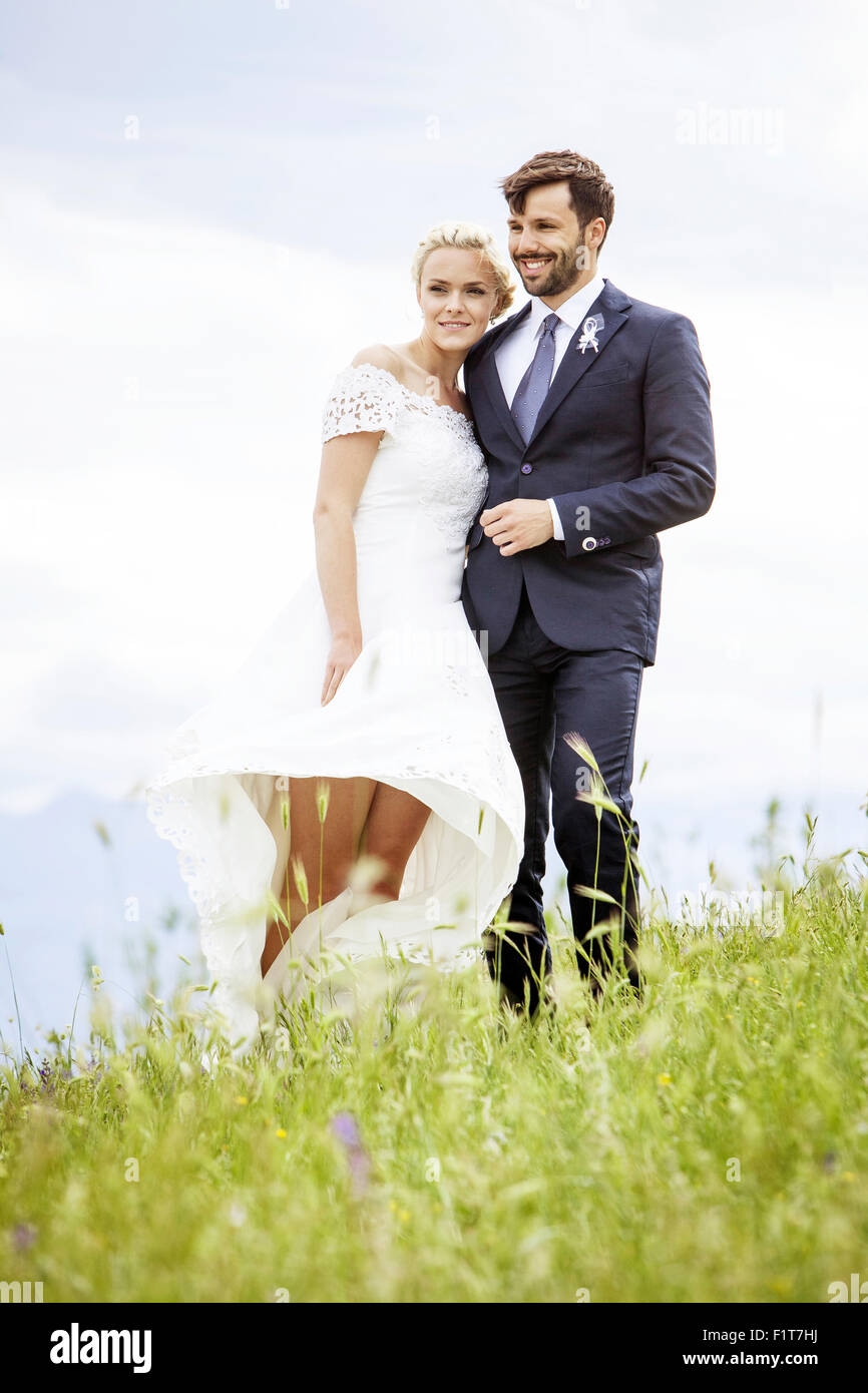 Bride and groom standing side by side Stock Photo