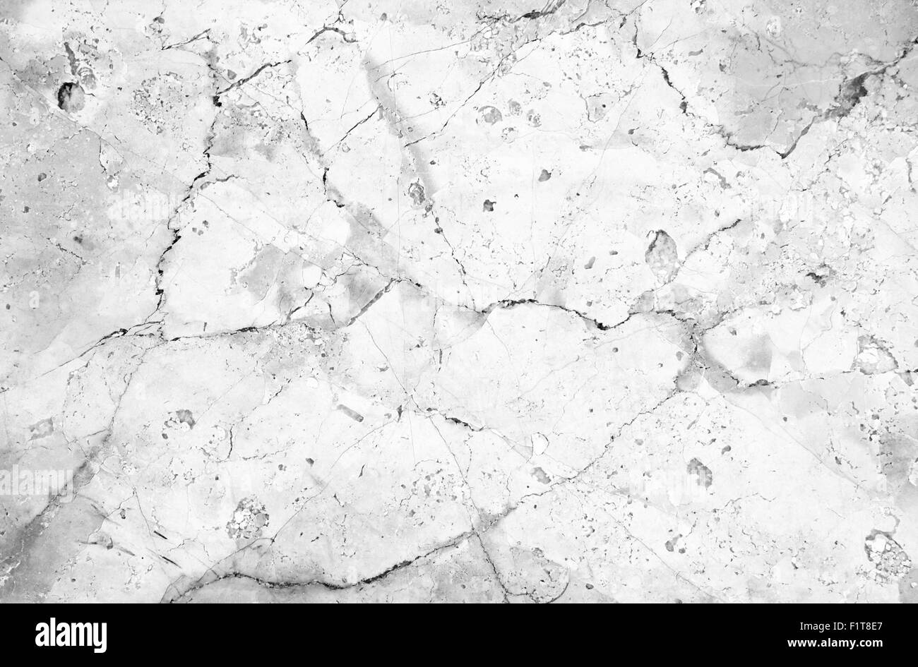 Background of white cracked marble stone texture Stock Photo