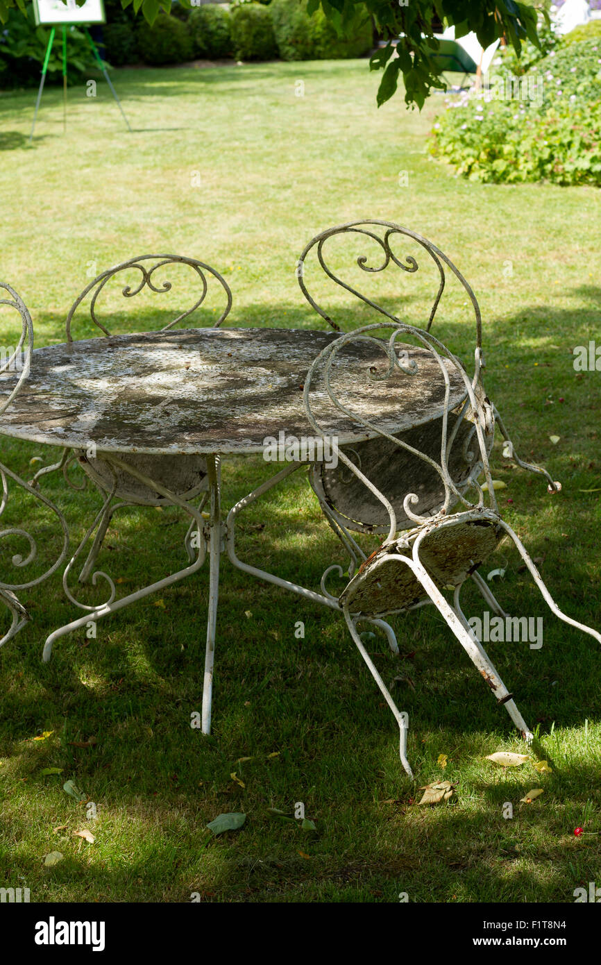 garden old rusty table chairs Stock Photo