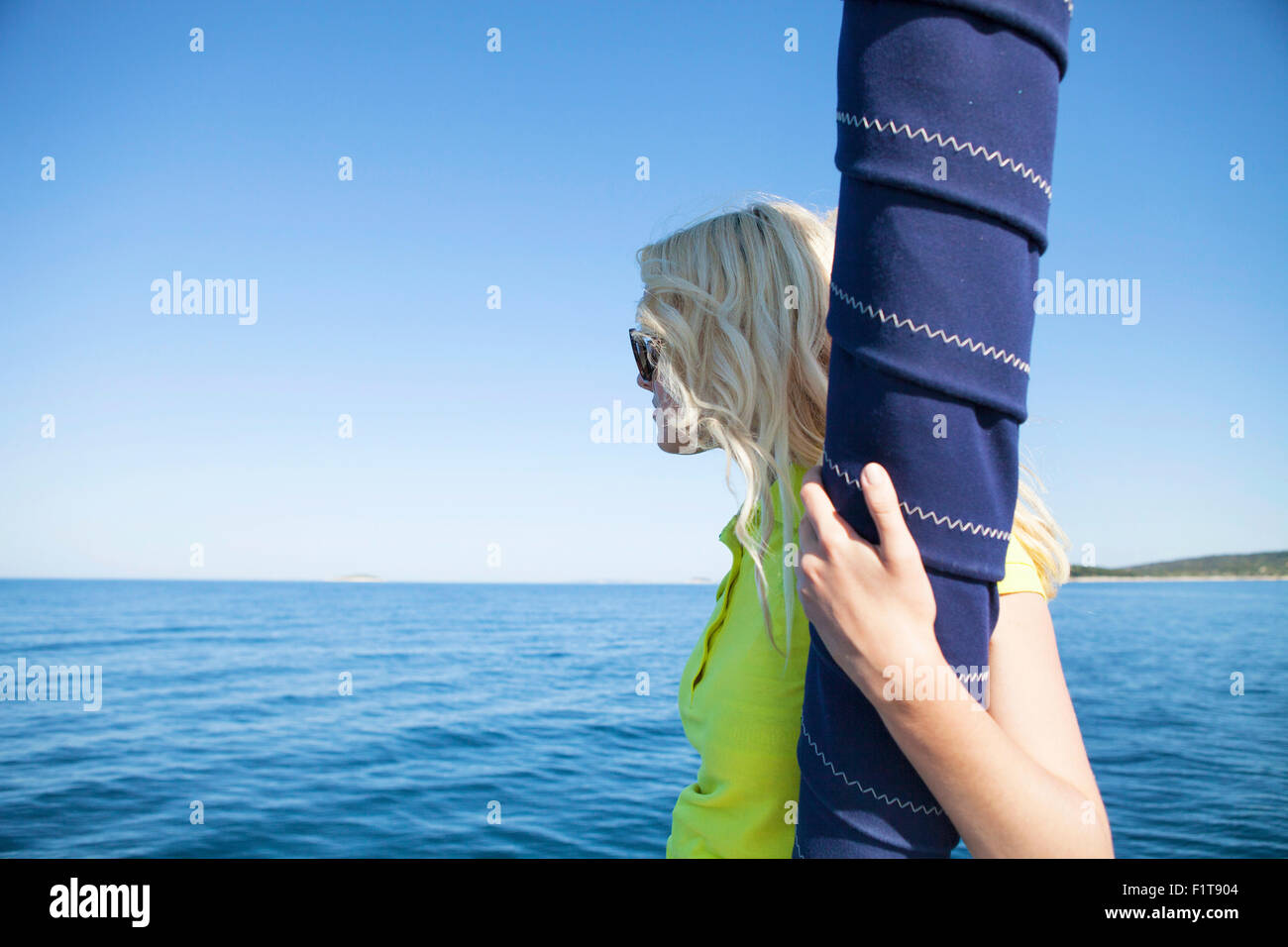 Woman overlooking seascape. Adriatic Sea Stock Photo