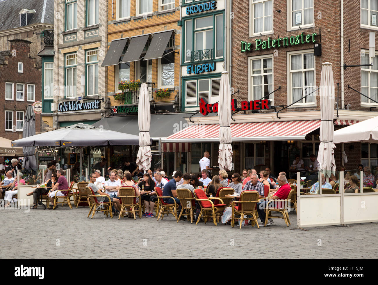 People sitting outside cafes in summer s-Hertogenbosch, Den Bosch, North Brabant province, Netherlands Stock Photo