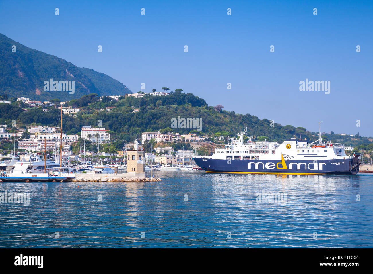 Casamicciola Terme, Italy - August 14, 2015: Maria Buono passenger ferry, operated by Madmar enters the port of Casamicciola Ter Stock Photo