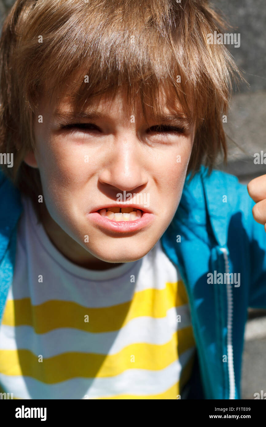 Blonde boy making face hi-res stock photography and images - Alamy