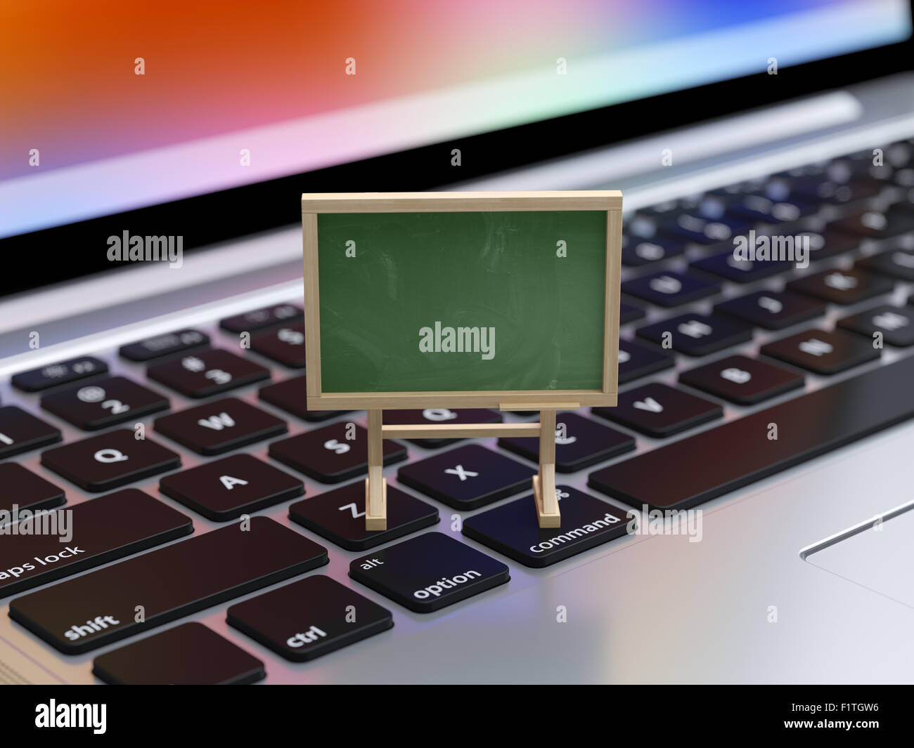 3d rendering of school blackboard on the laptop keyboard with soft focus. Online training, education concept Stock Photo