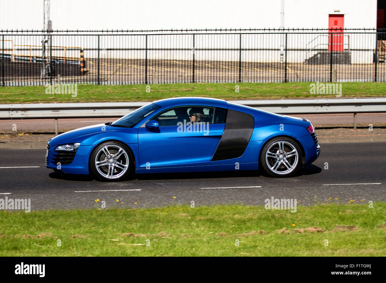 The Audi R8 is a midengine, 2seater super car travelling along the