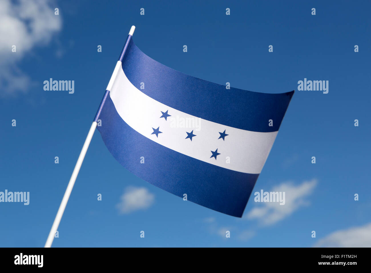 Honduras flag in front of a blue sky Stock Photo