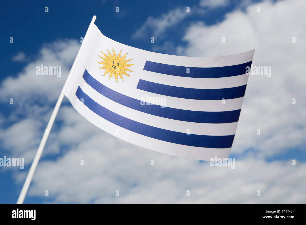 Uruguay flag in front of a blue sky Stock Photo
