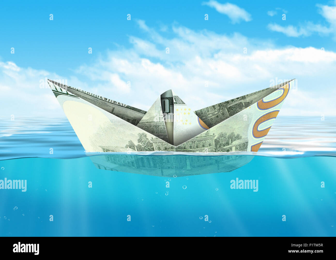 ship from dollar money floating at sea, finance concept Stock Photo