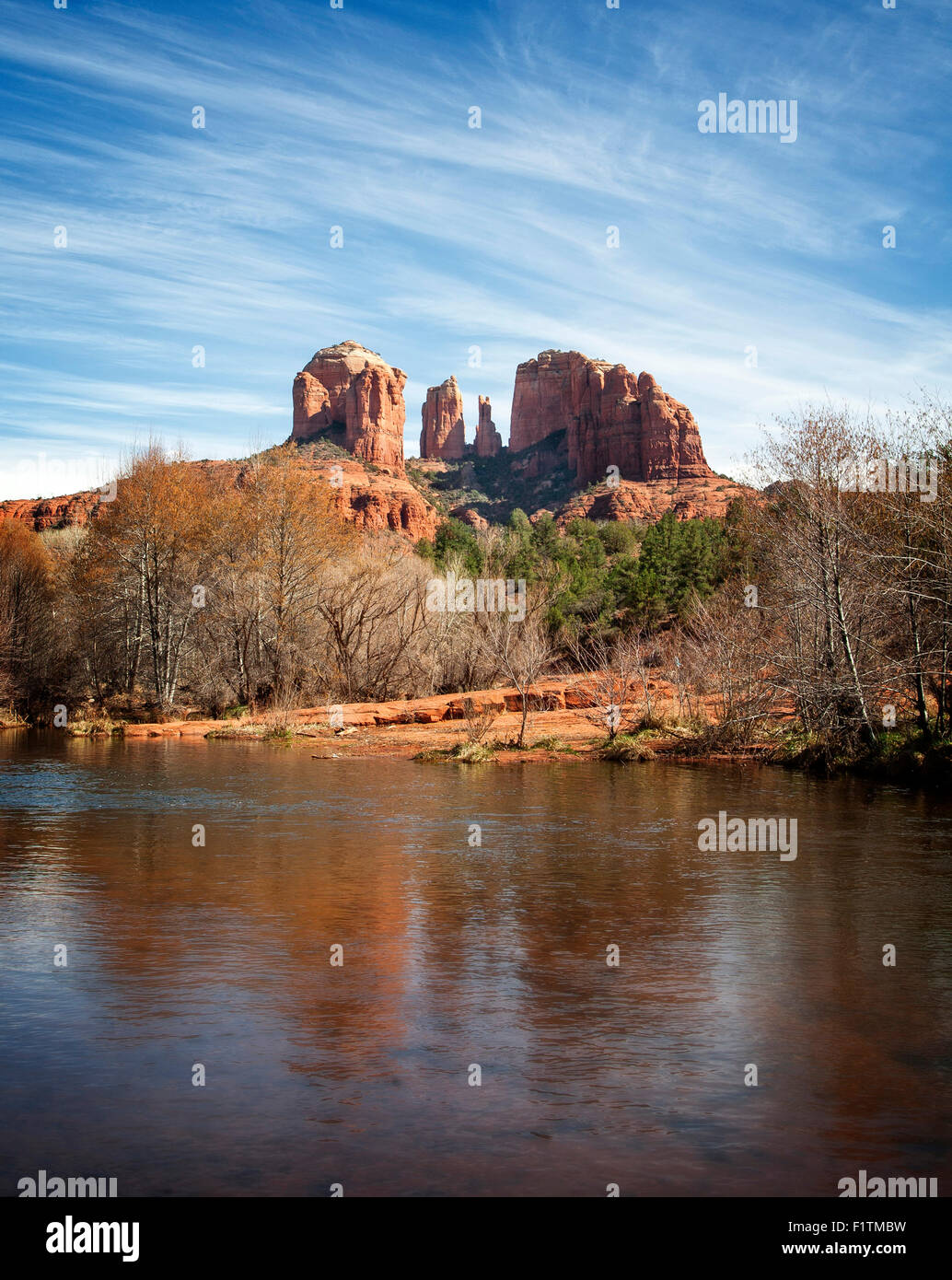 Cathedral Rock reflects in Oak Creek, Sedona, Arizona. Stock Photo