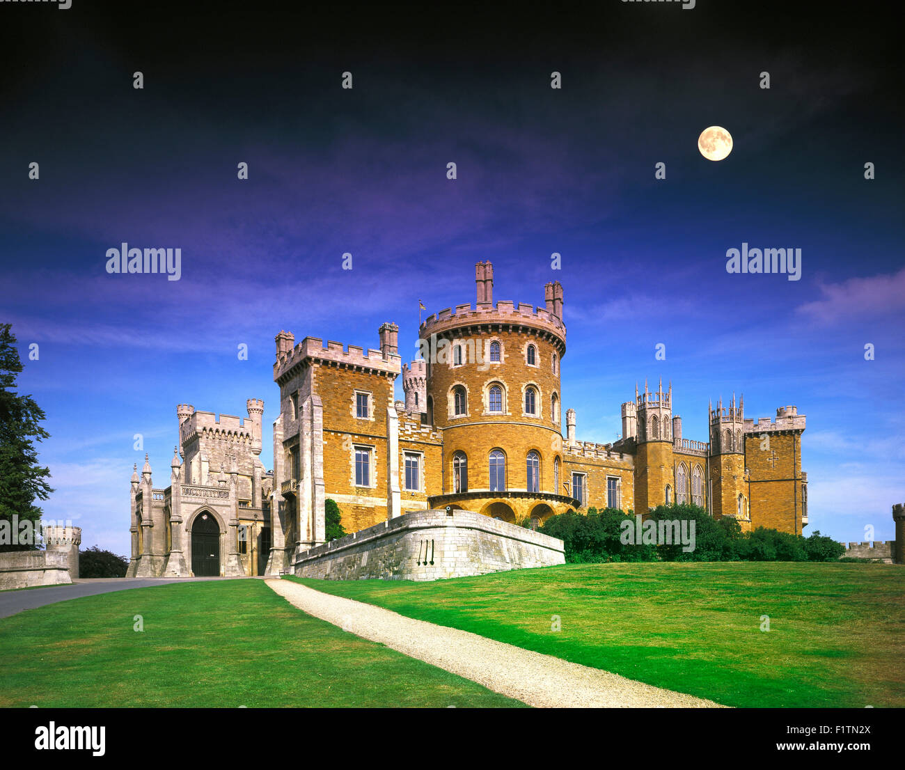 Moon over Belvoir Castle in the Vale of Belvoir,Melton Mowbray, Leicestershire England UK Stock Photo