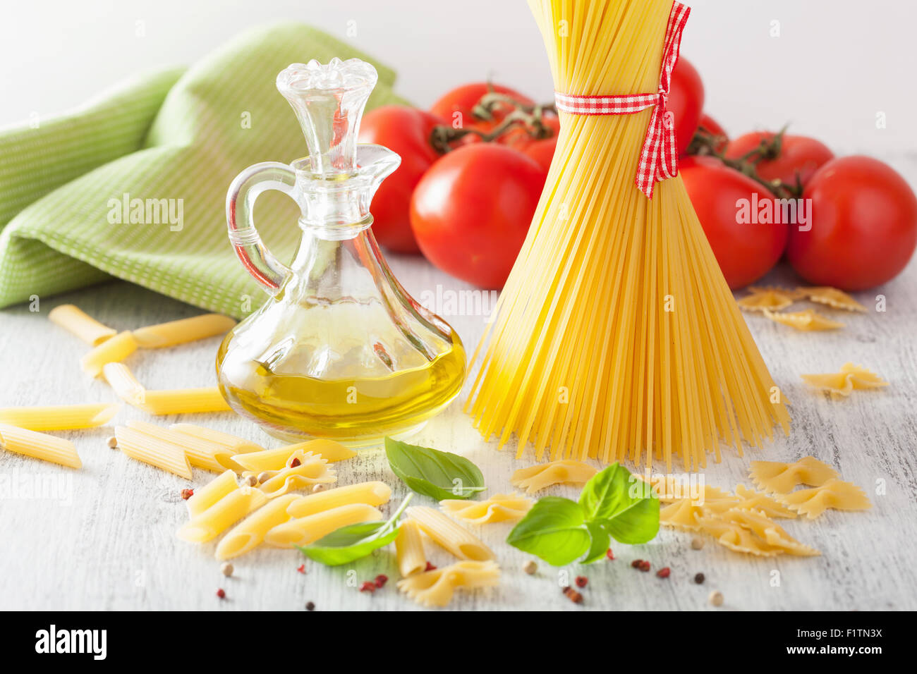 raw pasta olive oil tomatoes. italian cuisine Stock Photo Alamy