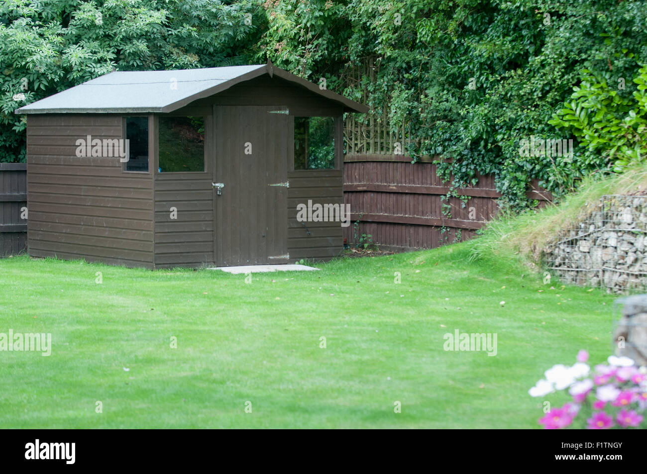 potting shed in a neat garden Stock Photo