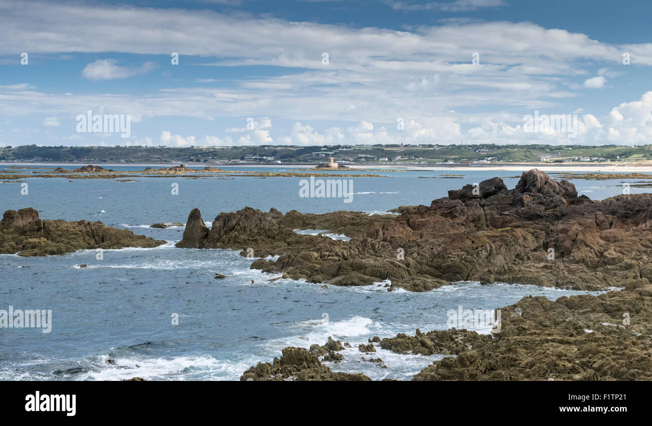 La Rocco Tower and St Ouen's bay from La Corbiere, Jersey Stock Photo