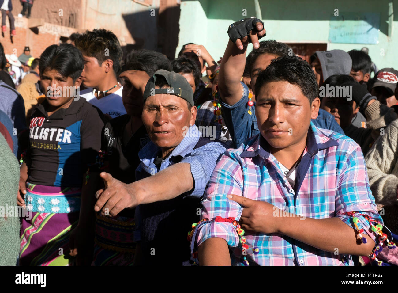 During the celebration of Tinku, several people confronting each other just before starting to fight. Stock Photo