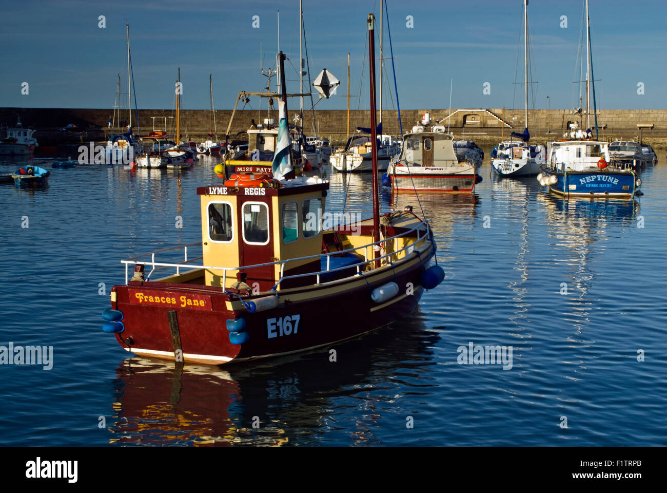 Fishing boats in The Cobb Harbour, Lyme Regis on Dorset's Jurassic