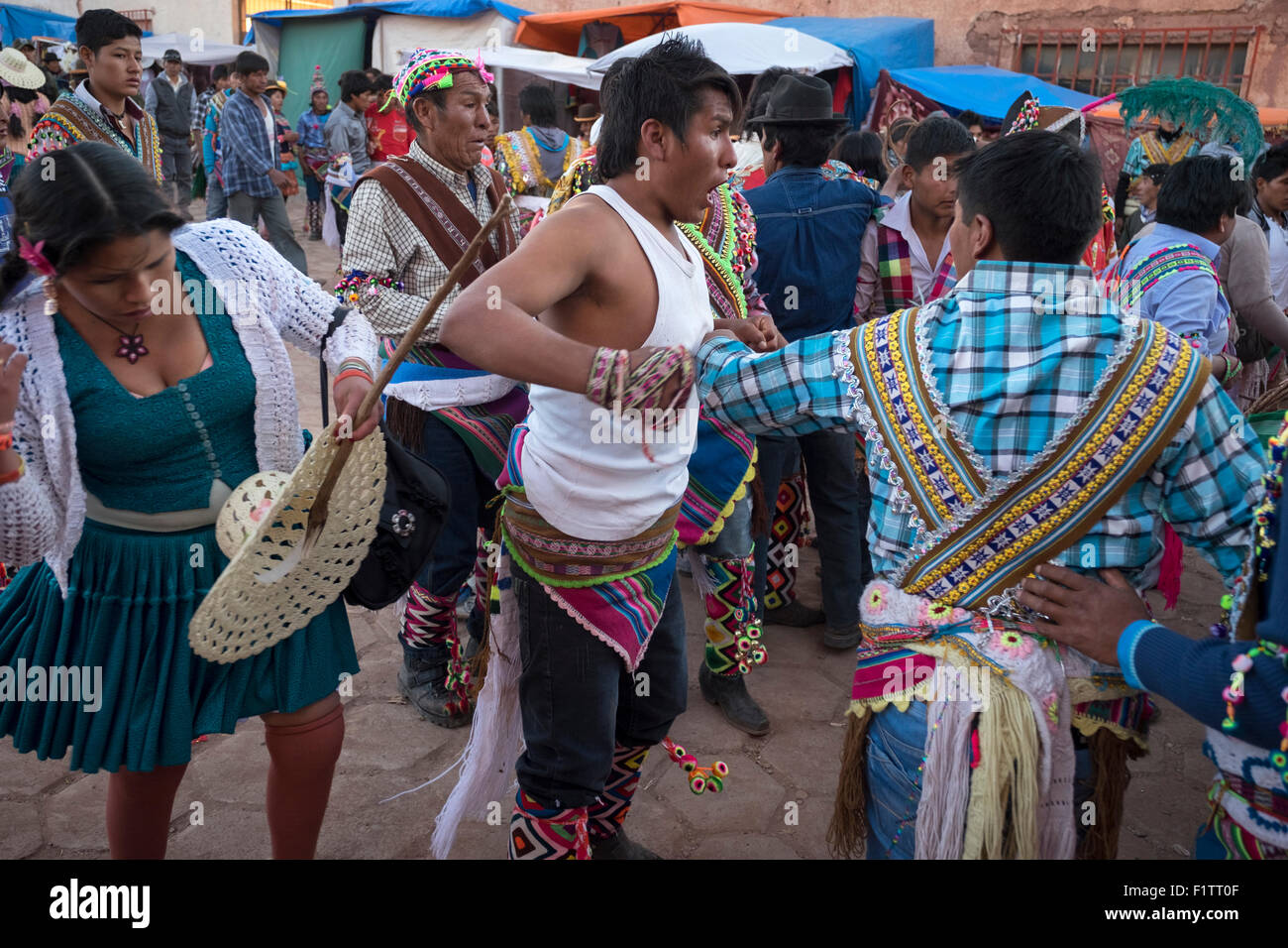 During the celebration of Tinku, several people confronting each other just before starting to fight. Stock Photo