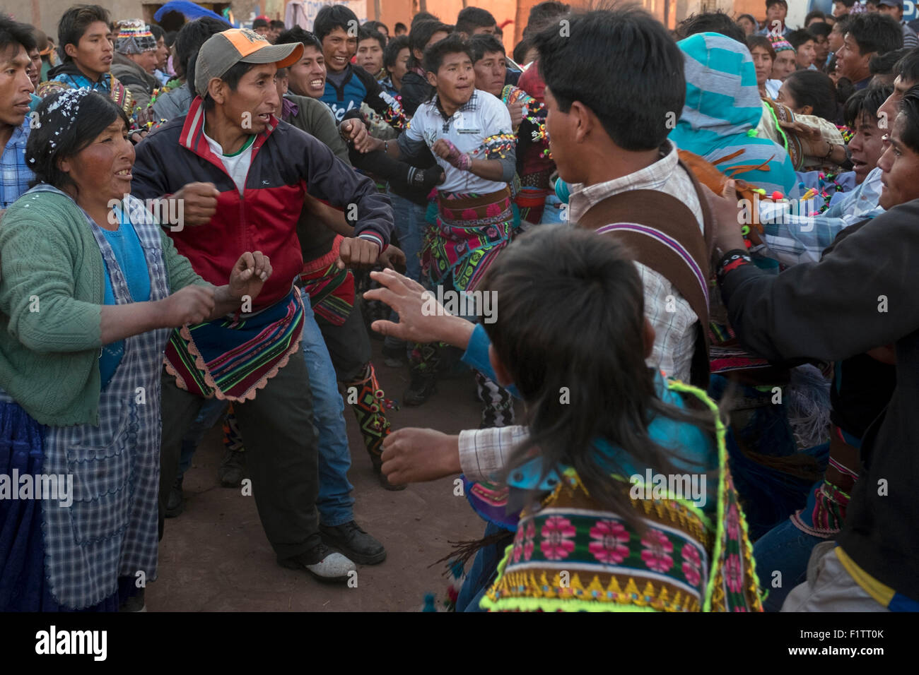 During the celebration of Tinku, several people confronting each other just before starting to fight. Stock Photo