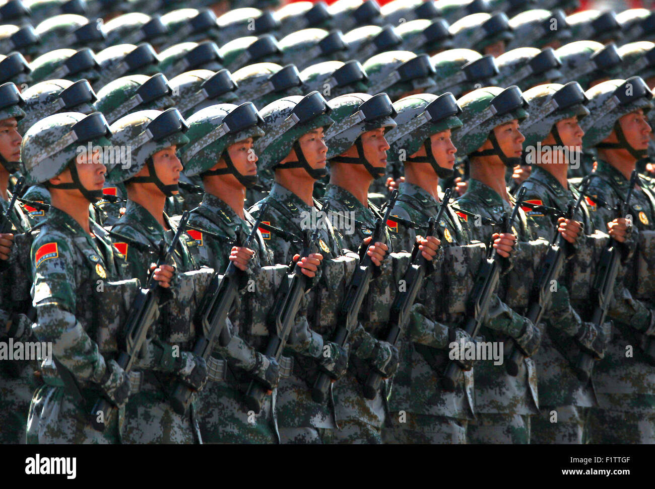 Sept. 3, 2015 - Beijing, CHINA - Over 12,000 soldiers and hundreds of tanks, ballistic missile launchers, amphibious assault vehicles, drones, fighter jets, helicopters and other military equipment participate in a massive parade marking the 70th anniversary of victory over Japan and the end of World War II in Beijing on September 3, 2015. Presiding over the extravaganza, President Xi Jinping, China's most powerful leader in decades, said that China would remain committed to ''the path of peaceful development'' and unexpectedly vowed to cut 300,000 troops from its 2.3-million strong military, Stock Photo