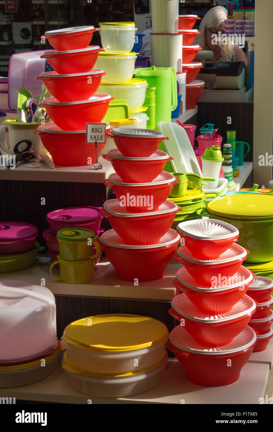 Big Sale: Tupperware in the mall. A display of colourful Tupperware with a  small sign advertising a big sale. West Edmonton Mall Stock Photo - Alamy