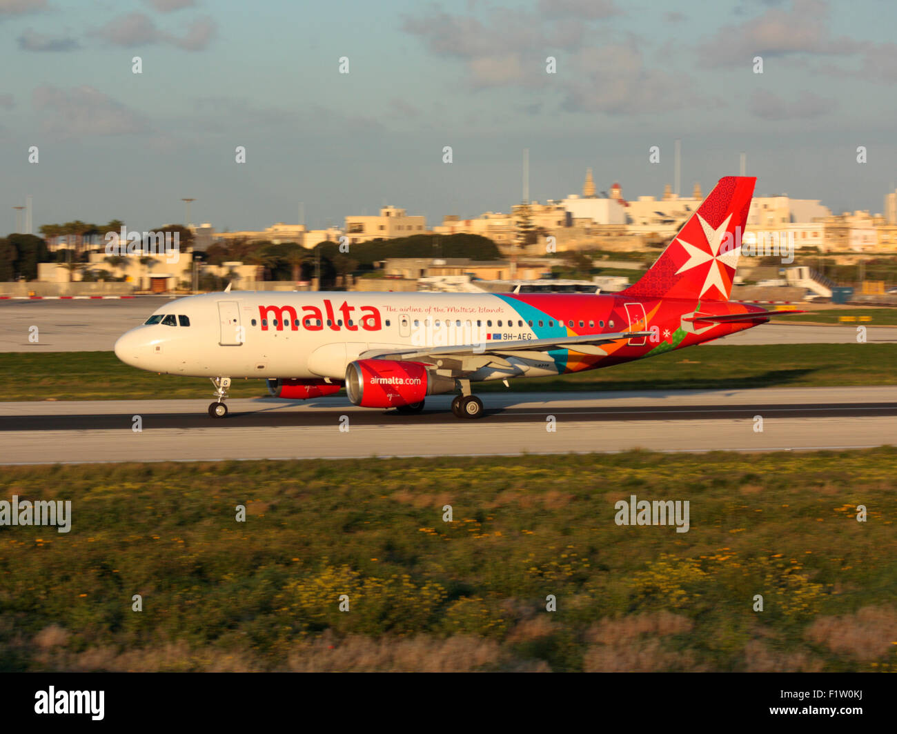 Air travel. Air Malta Airbus A319 airliner taking off from Malta Stock Photo