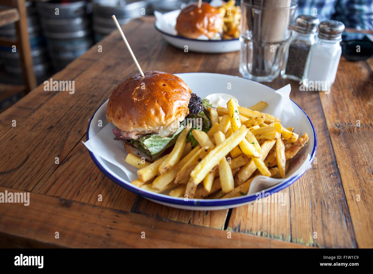 Sussex Longhorn burger and chips at Lucky Beach, Brighton, UK Stock Photo