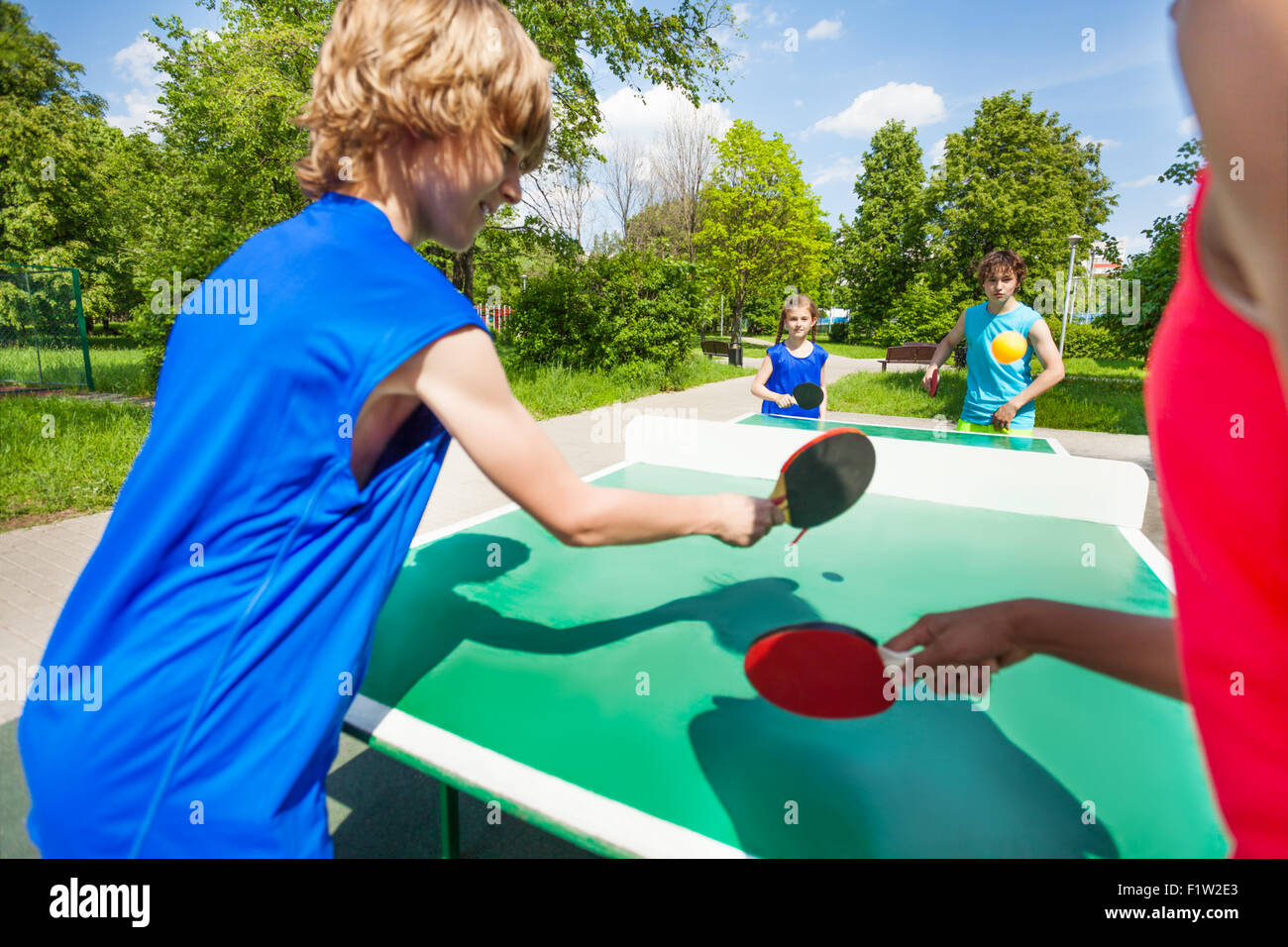 Boy playing ping pong table tennis hires stock photography and images