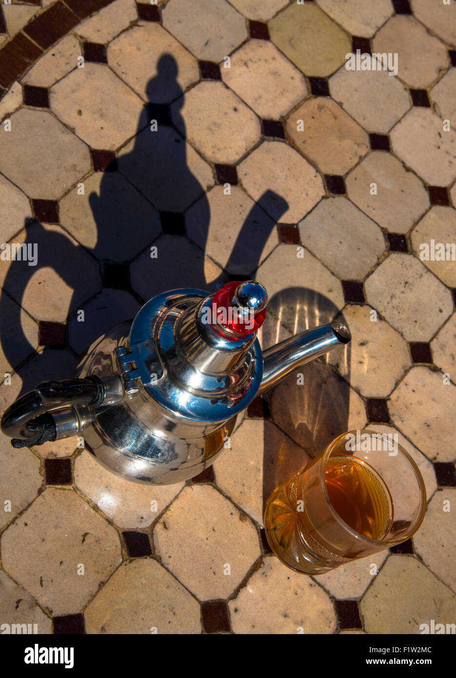 teapot and glass at table in maroc Stock Photo