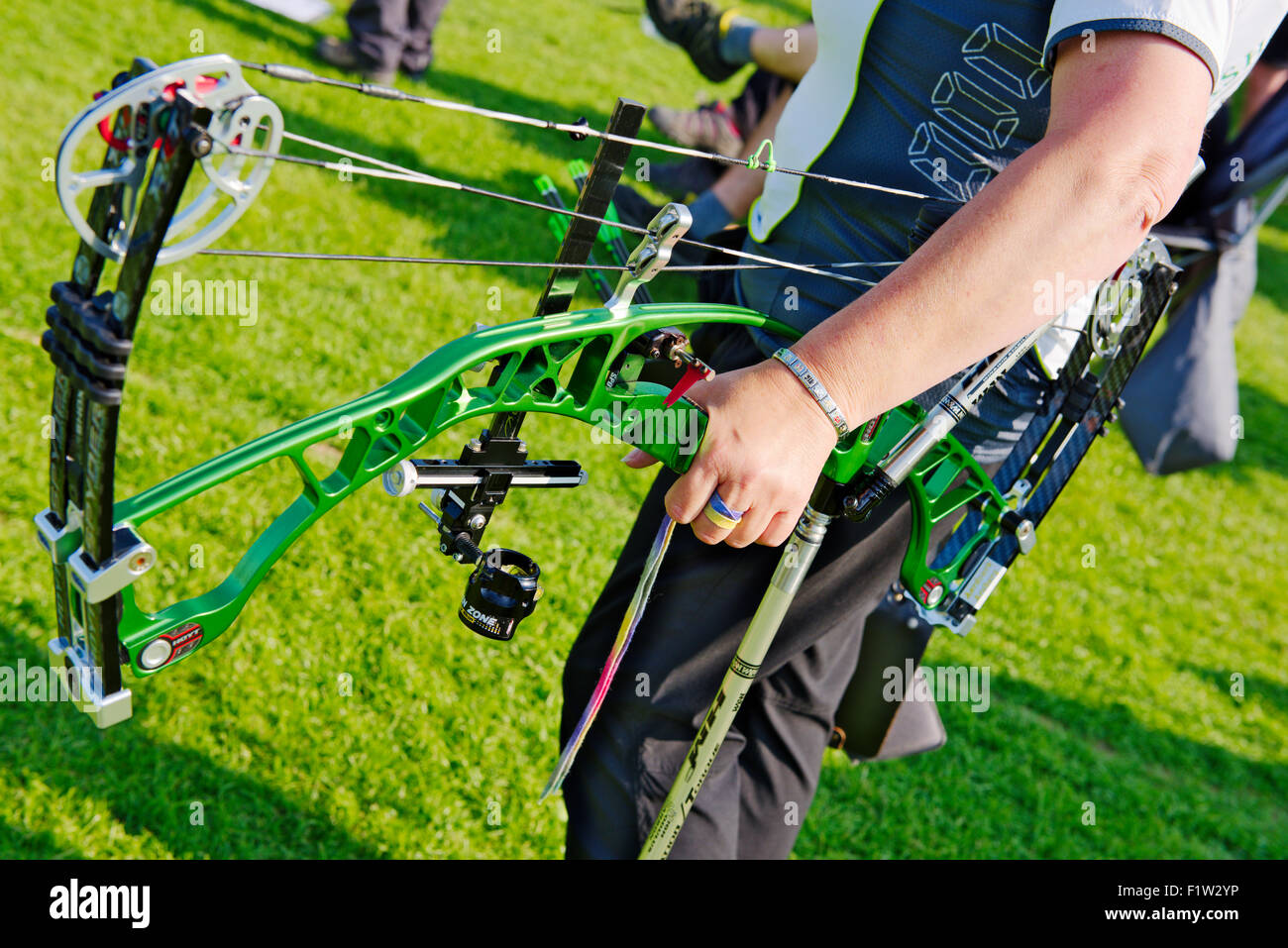 Archer holding compound bow Stock Photo