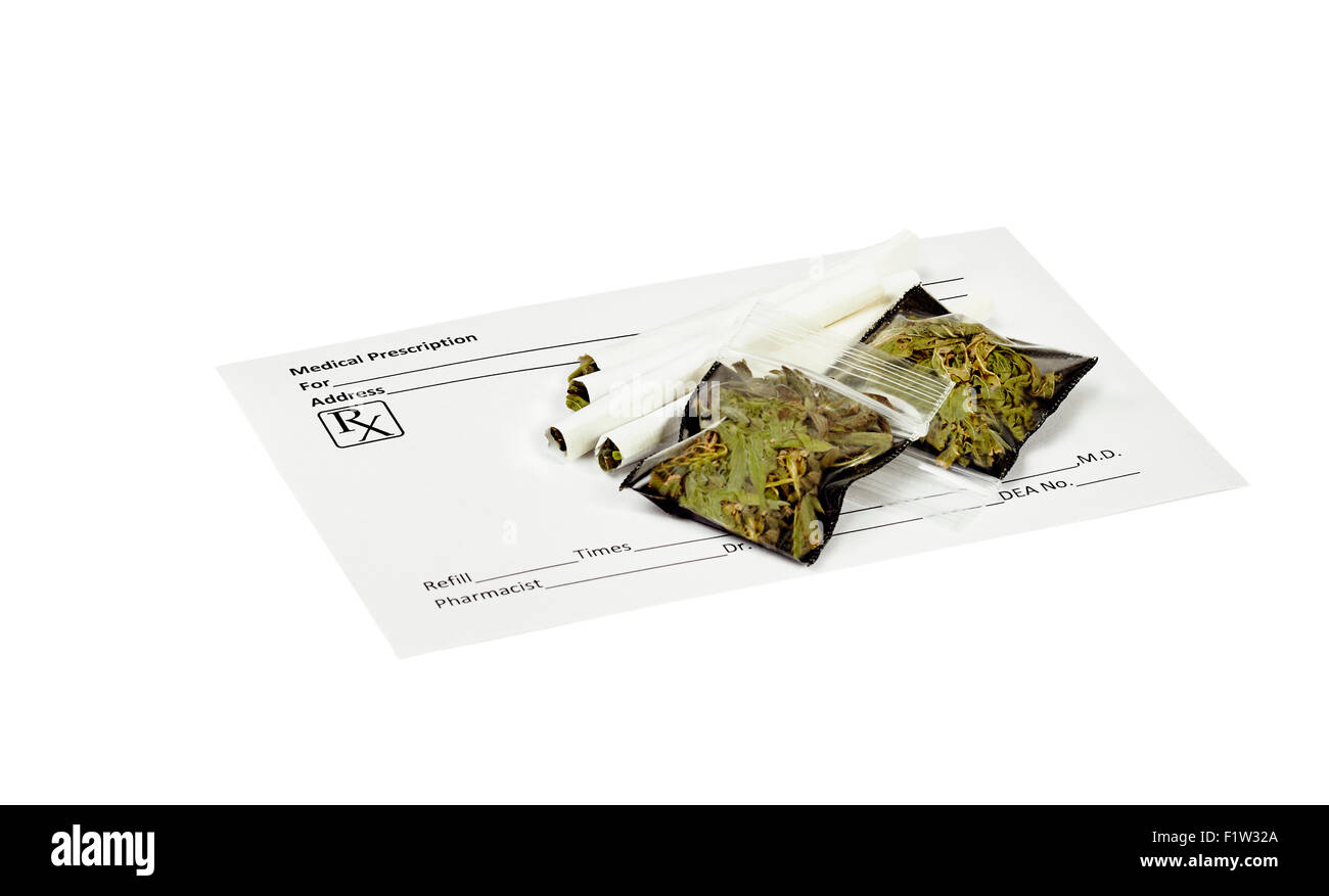 Prescription marijuana cigarettes with blank prescription form and packets  of dried marijuana leaves Stock Photo