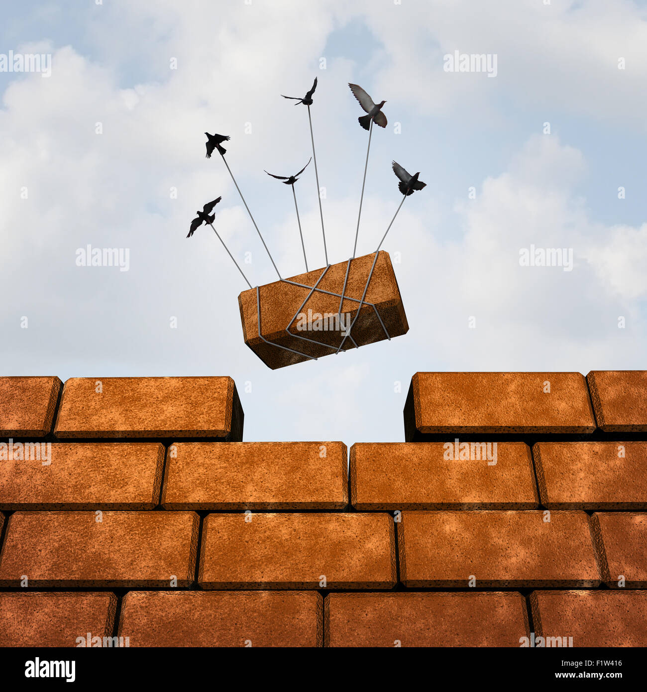 Build a wall business concept as a group of birds placing a brick to complete a wall as a puzzle metaphor and working together symbol for creating a successful structure with organized strategy and  planning. Stock Photo