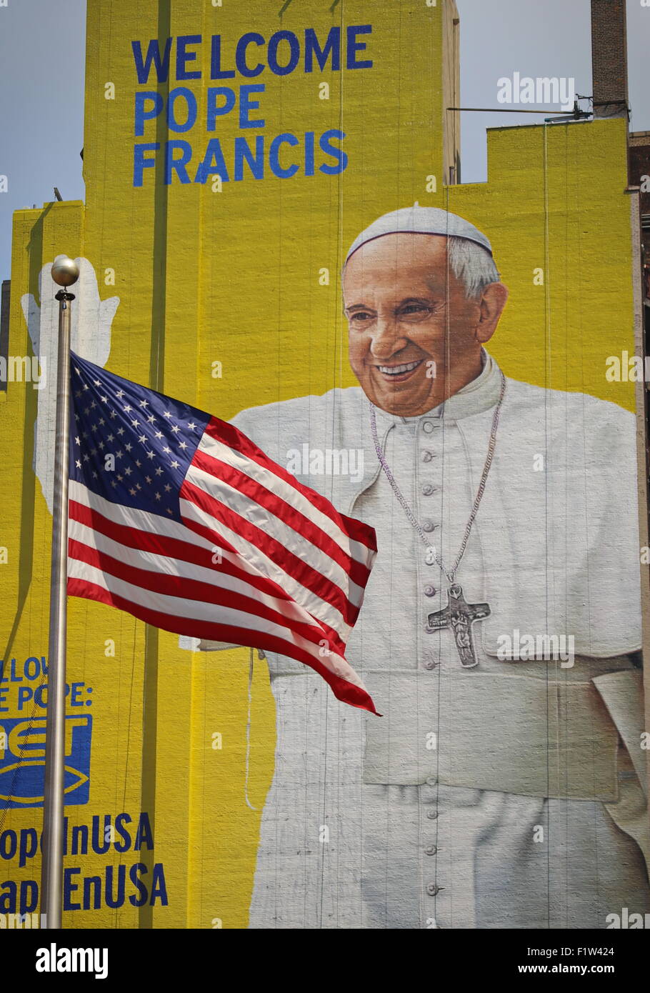 A billboard near Madison Square Garden is prepared to welcome Pope Francis in September. The Holy Father will lead a mass at Mad Stock Photo