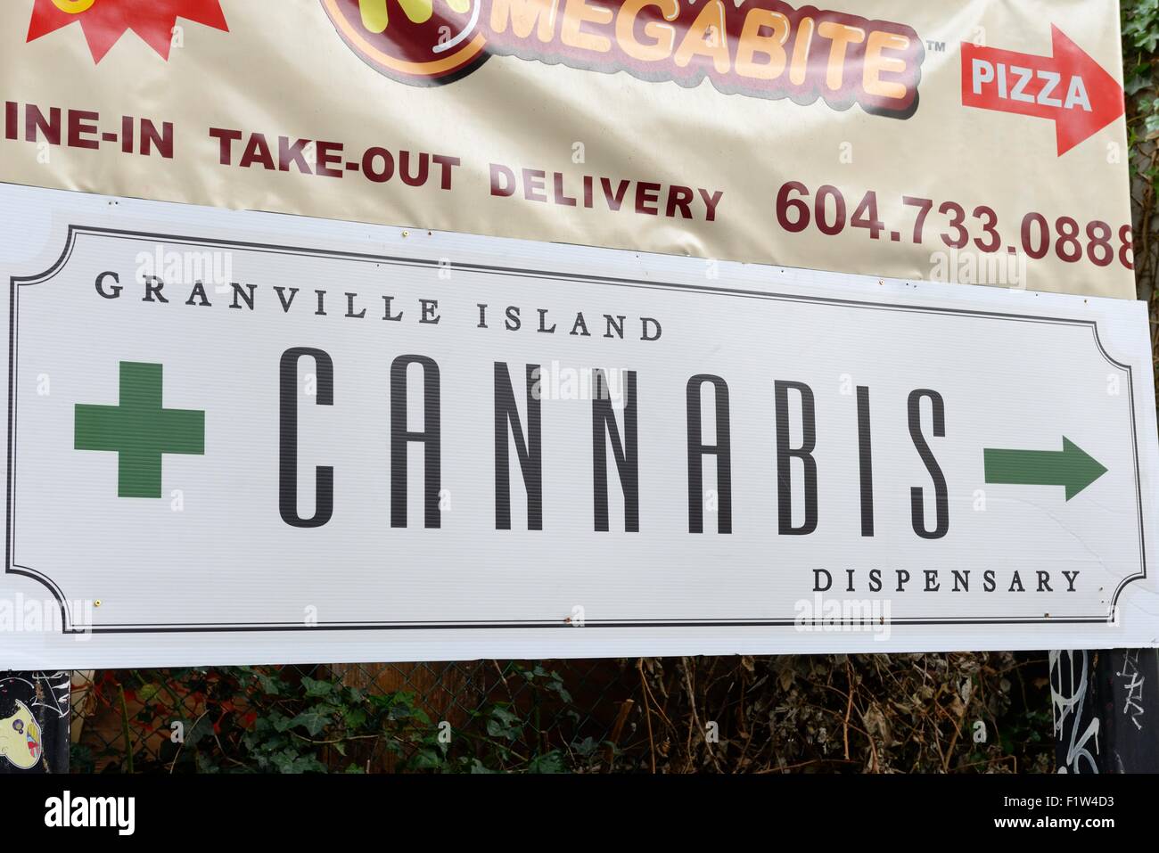 Sign attracting attention for a cannabis dispensary in Granville Island, Vancouver, Canada Stock Photo