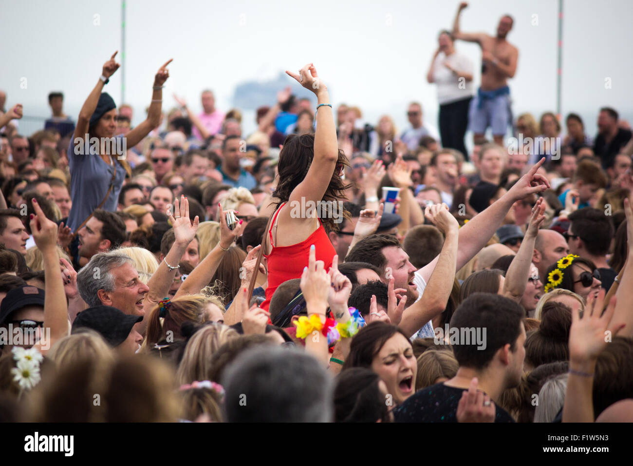 Crowd hands in air women hi-res stock photography and images - Alamy
