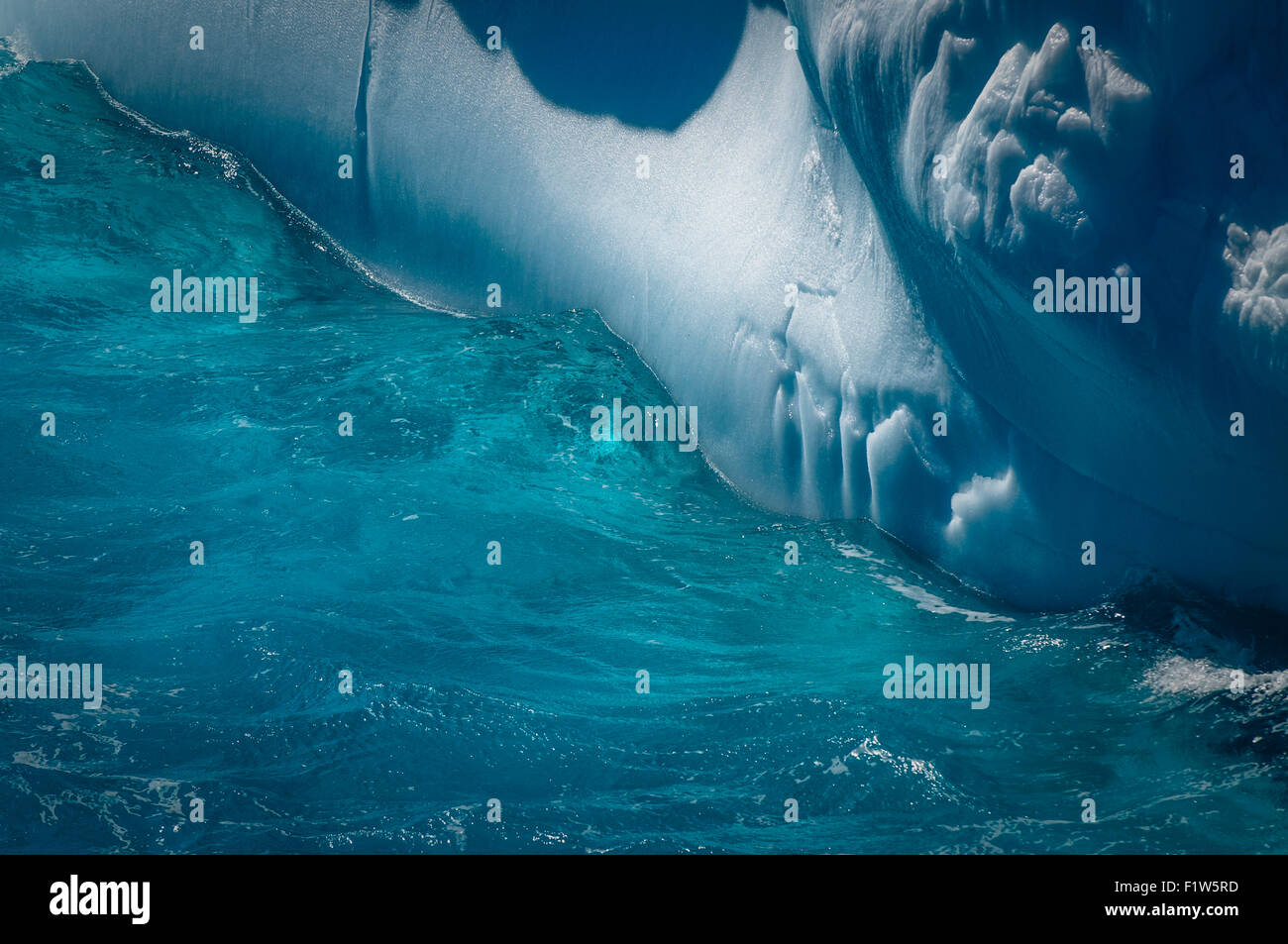 A detail shot of a large blue iceberg from Antarctica Stock Photo