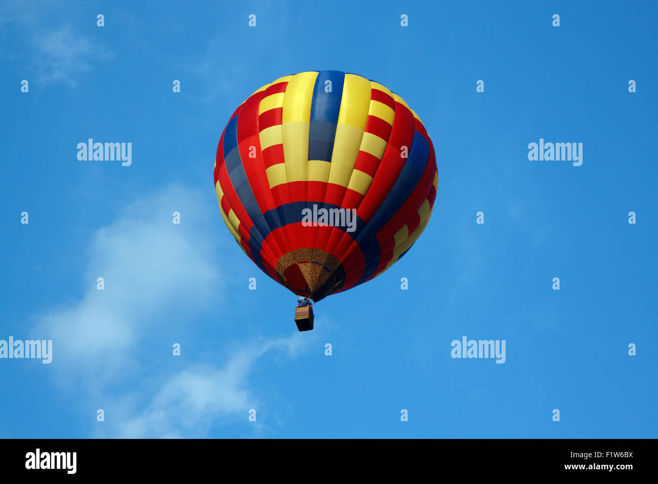 Colorful hot air balloon on the blue sky Stock Photo - Alamy
