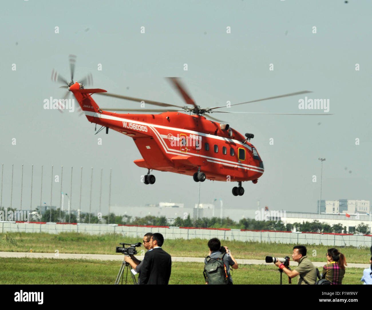 Tianjin, China. 7th Sep, 2015. A helicopter practises for the coming China Helicopter Exposition in a helicopter base of Aviation Industry Corporation of China in the Airport Area of China Pilot Free Trade Zone of Tianjin, north China, Sept. 7, 2015. The exposition will be opened on Sept. 9. © Wang Huan/Xinhua/Alamy Live News Stock Photo