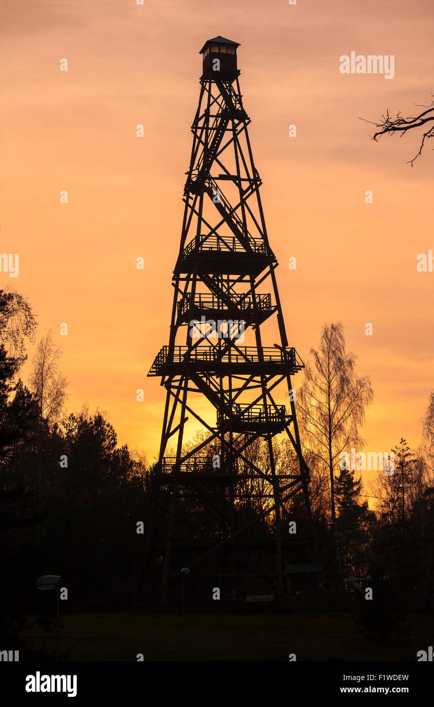 Silhouette of tall forest fire watch tower Stock Photo Alamy