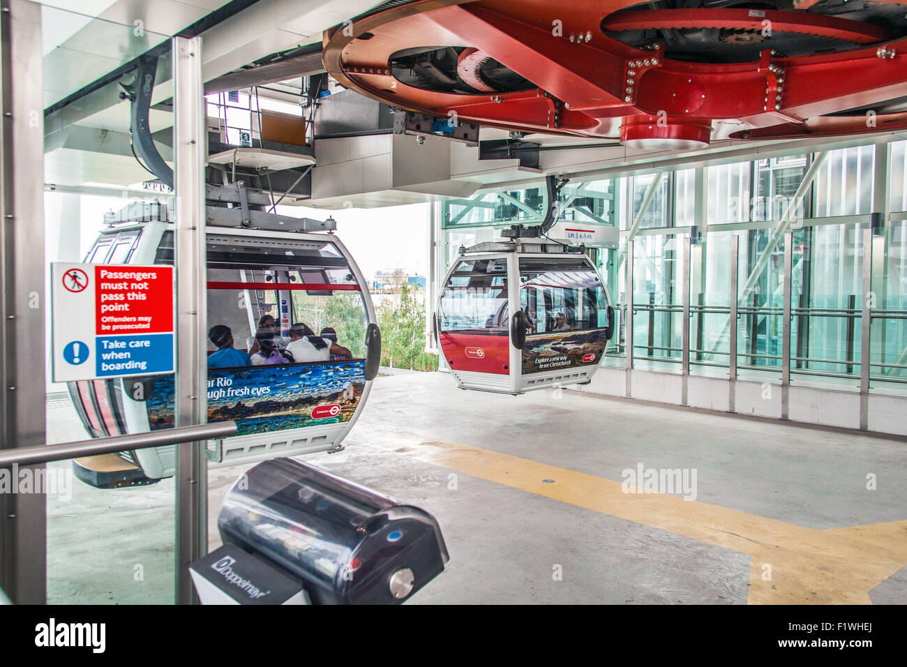 Passengers boarding the Emirates Air Line cable car crossing the River ...