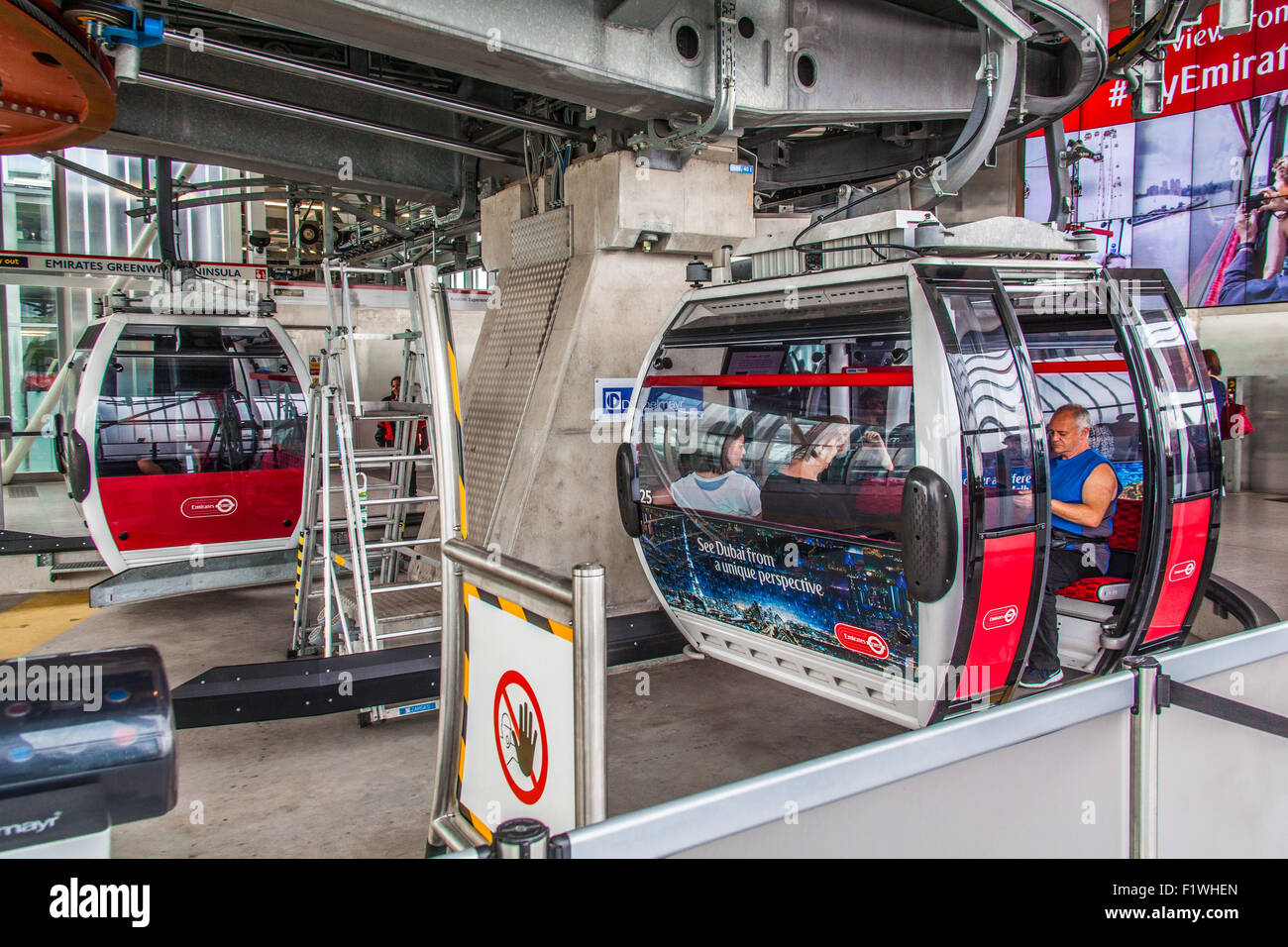 Passengers boarding the Emirates Air Line cable car crossing the River ...