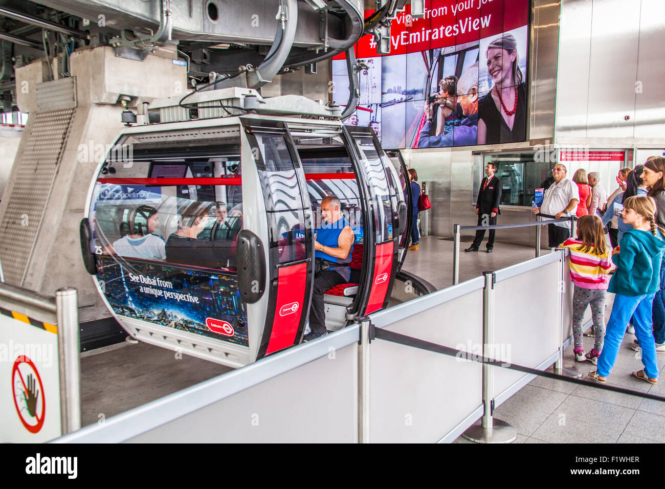 Passengers boarding the Emirates Air Line cable car crossing the River ...