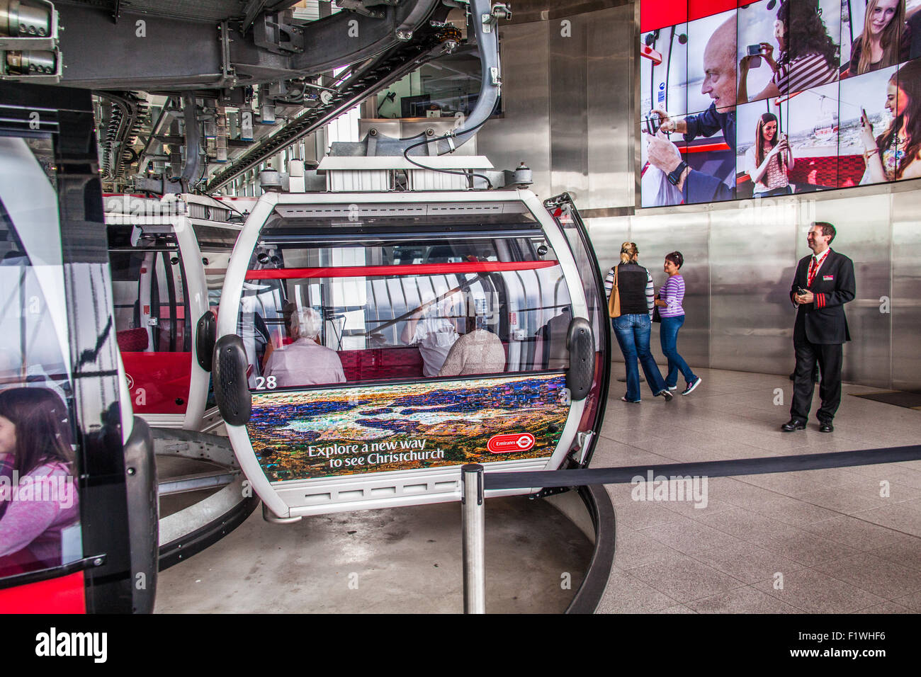 Passengers boarding the Emirates Air Line cable car crossing the River ...