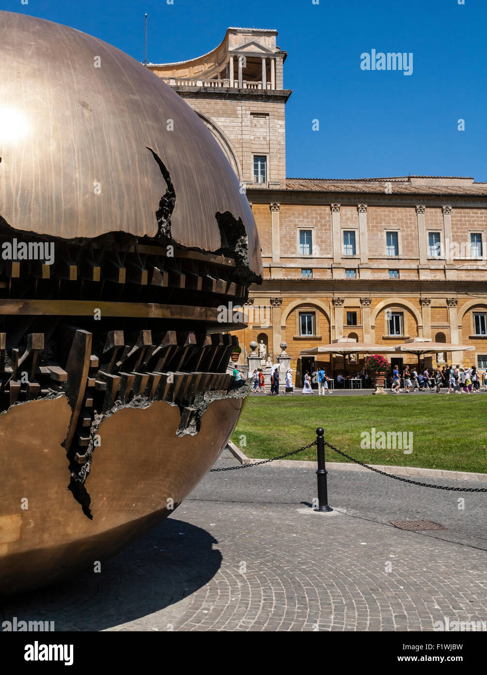 Sphere Within Sphere sculpture by Pomodoro in the Cortile della Pigna, Vatican Museum Gardens, Rome, Lazio, Italy Stock Photo