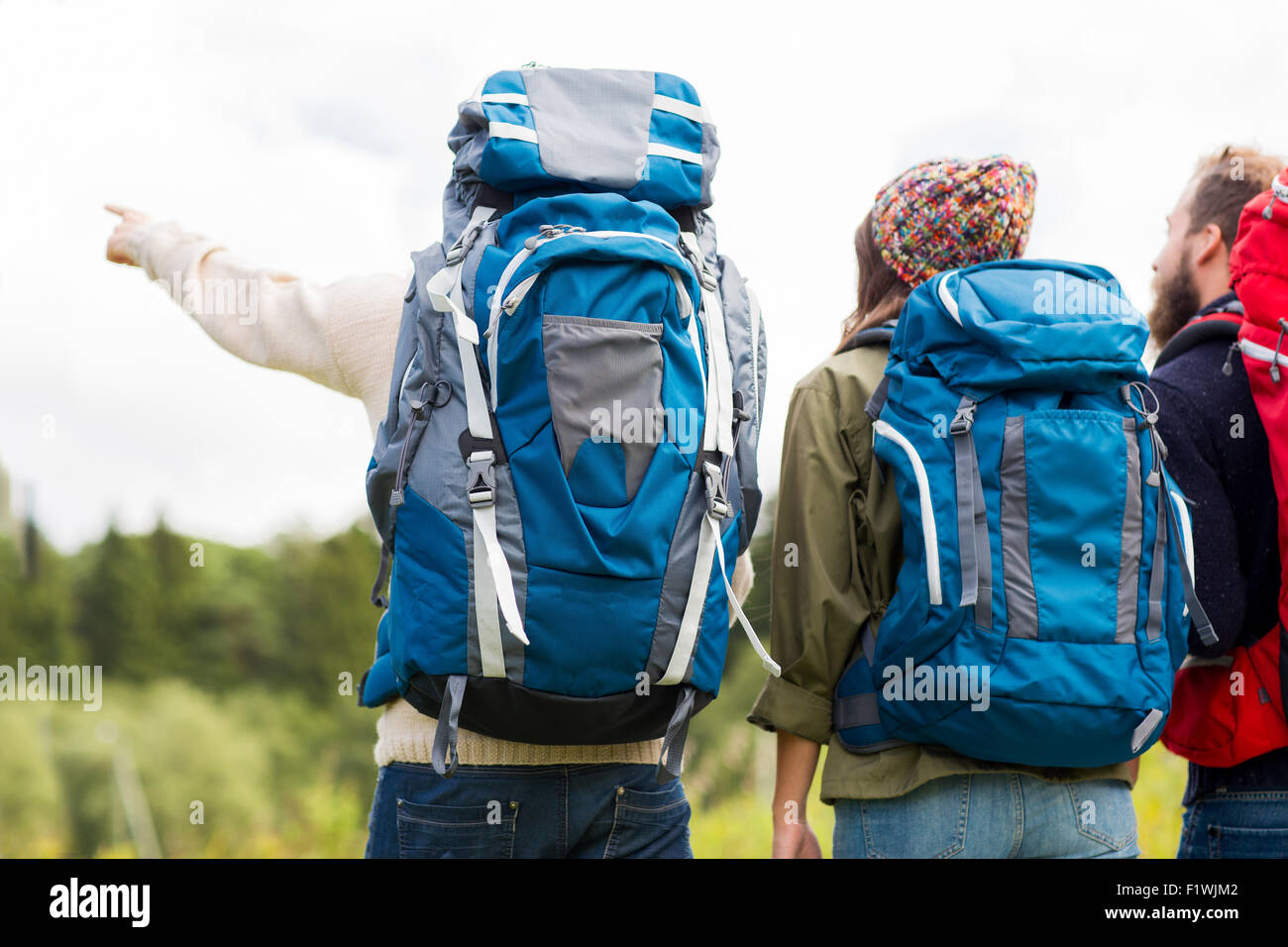 Couple happy hikers backpacks hi-res stock photography and images - Alamy