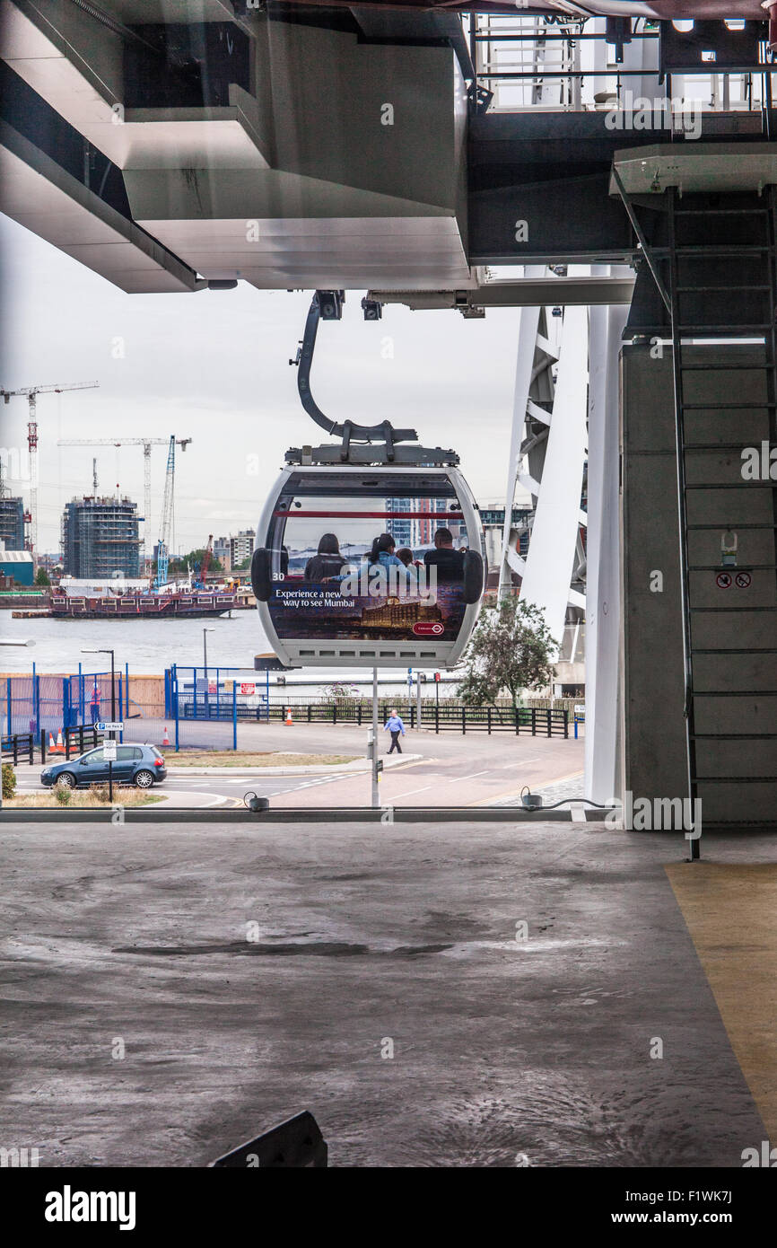 Emirates Air Line cable car crossing the River Thames from North ...