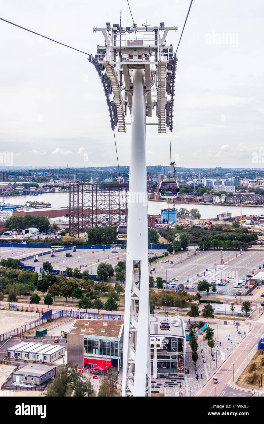 Emirates Air Line cable car crossing the River Thames from North ...