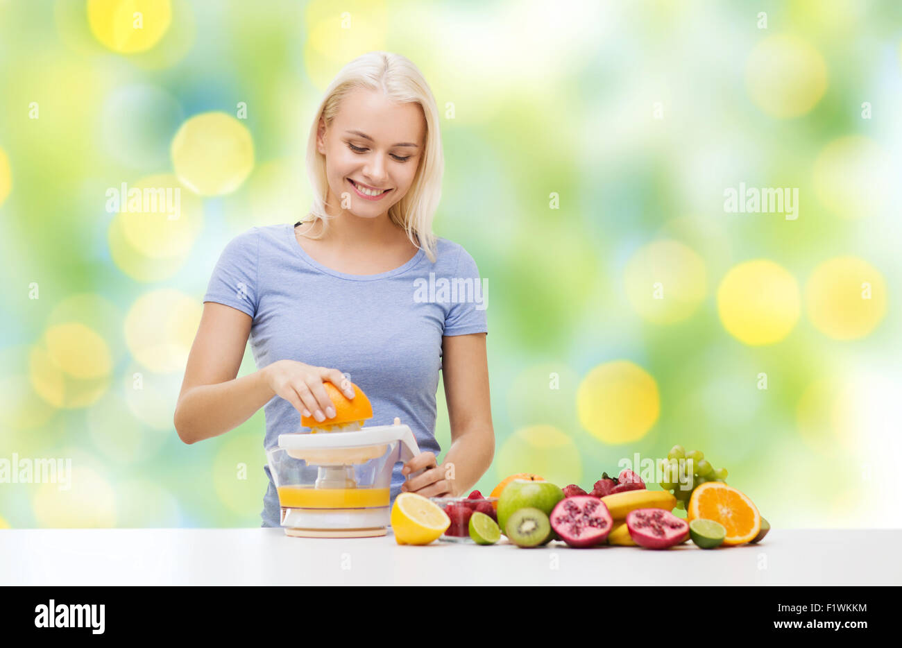 Squeezing fruit juice hi-res stock photography and images - Alamy