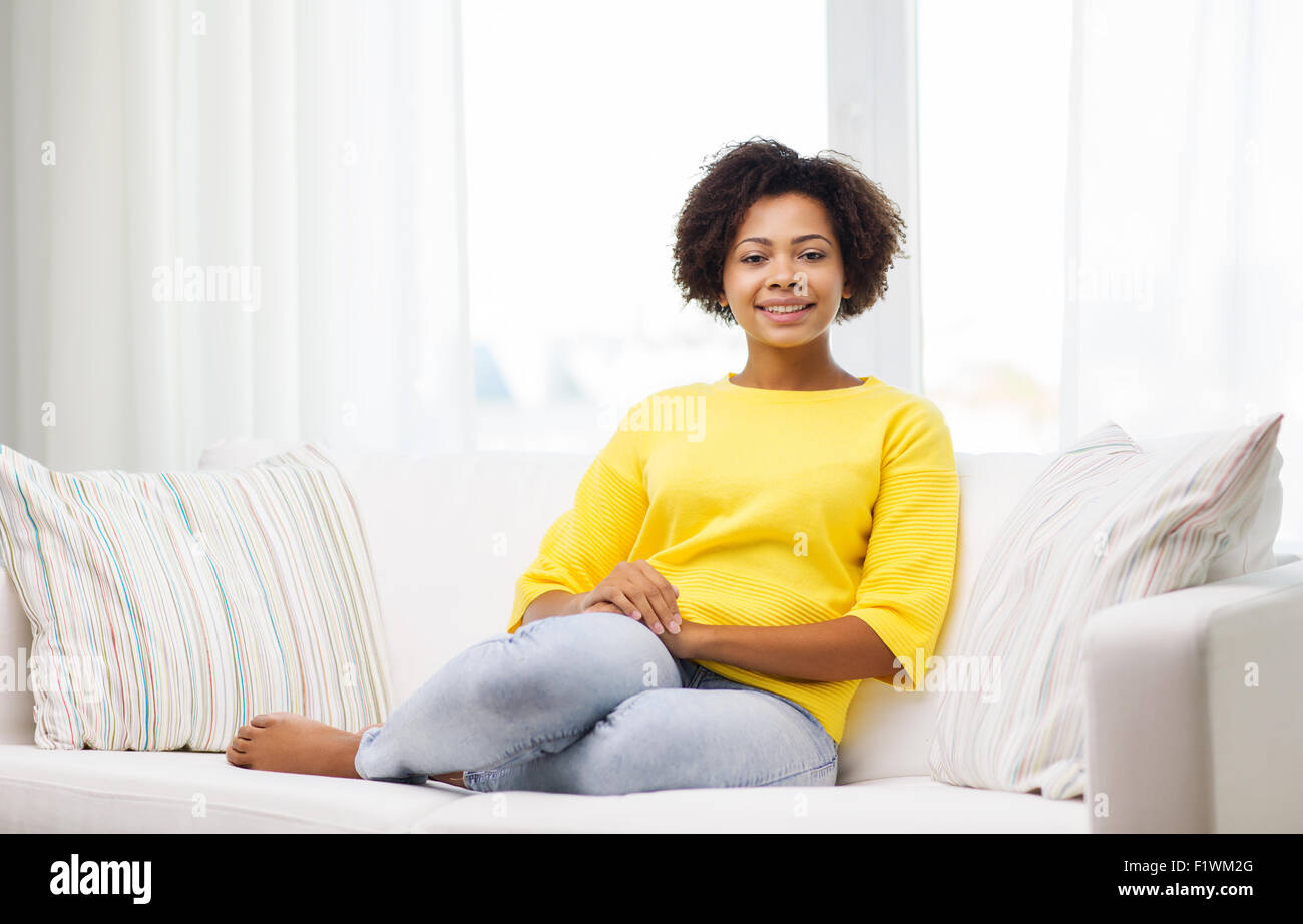 happy african american young woman at home Stock Photo - Alamy