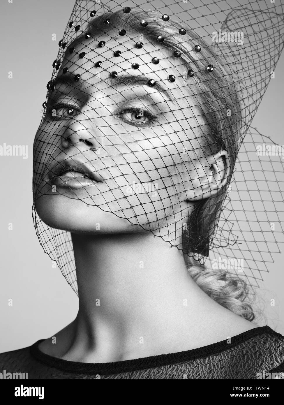 Portrait of young beautiful woman close up. Perfect makeup. Perfect skin. Fashion photo Stock Photo